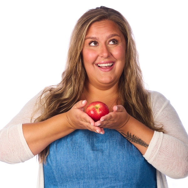 Mel Stahn holding an apple