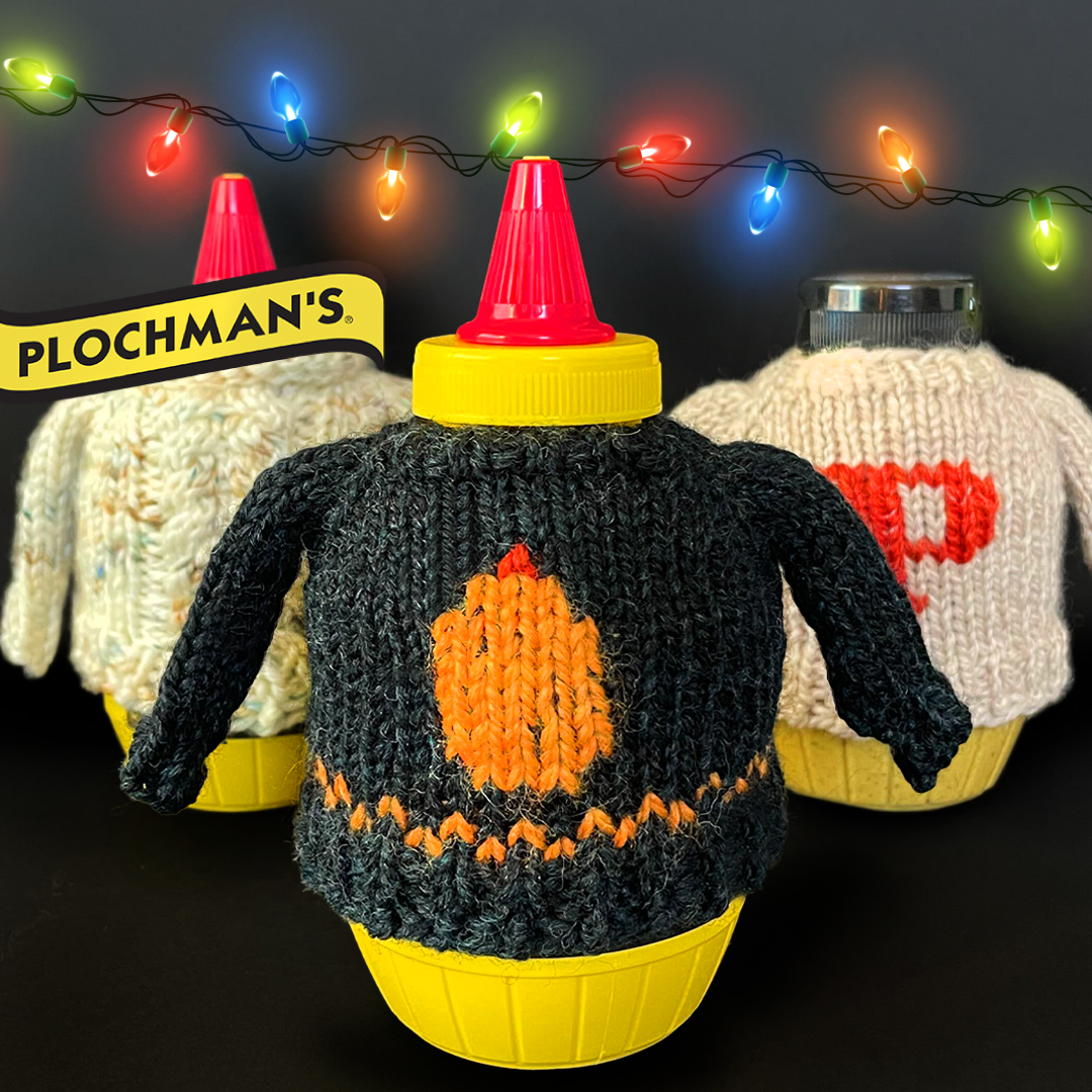 Plochman's mustard bottles with holiday sweaters and lights