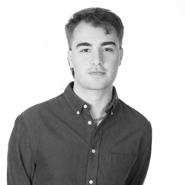 Justin Goetz headshot in black and white