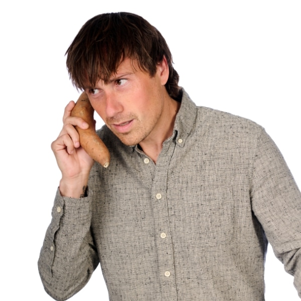 Jake holding a sweet potato