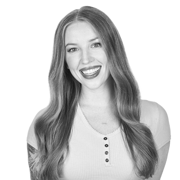 Sam's headshot in black and white