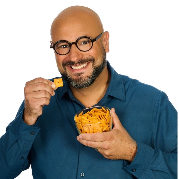 Frank holding a bowl of Cheez Its