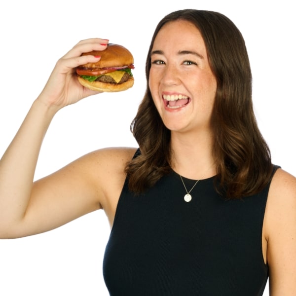 Marie holding a cheeseburger