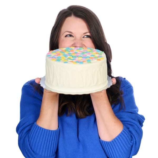 Nicole holding a cake