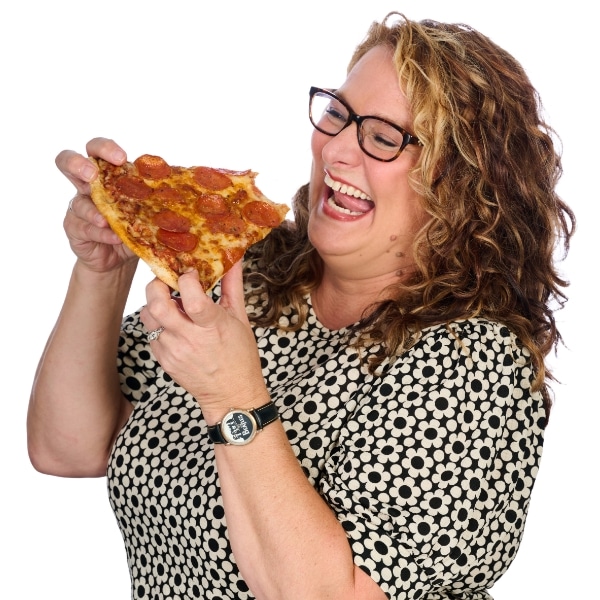 Tivi eating a slice of pizza